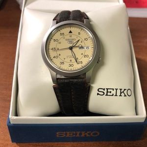 Seiko snk803 with a leather watch band